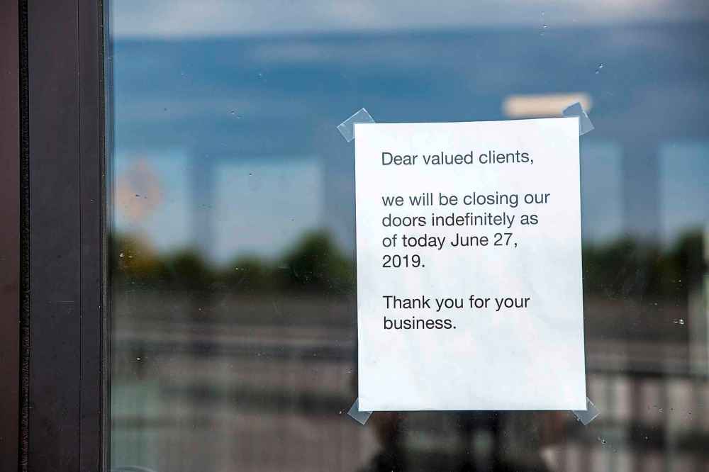 MIKAELA MACKENZIE / WINNIPEG FREE PRESS
A sign on the door at White Lotus Pet Spa on Donald Street.