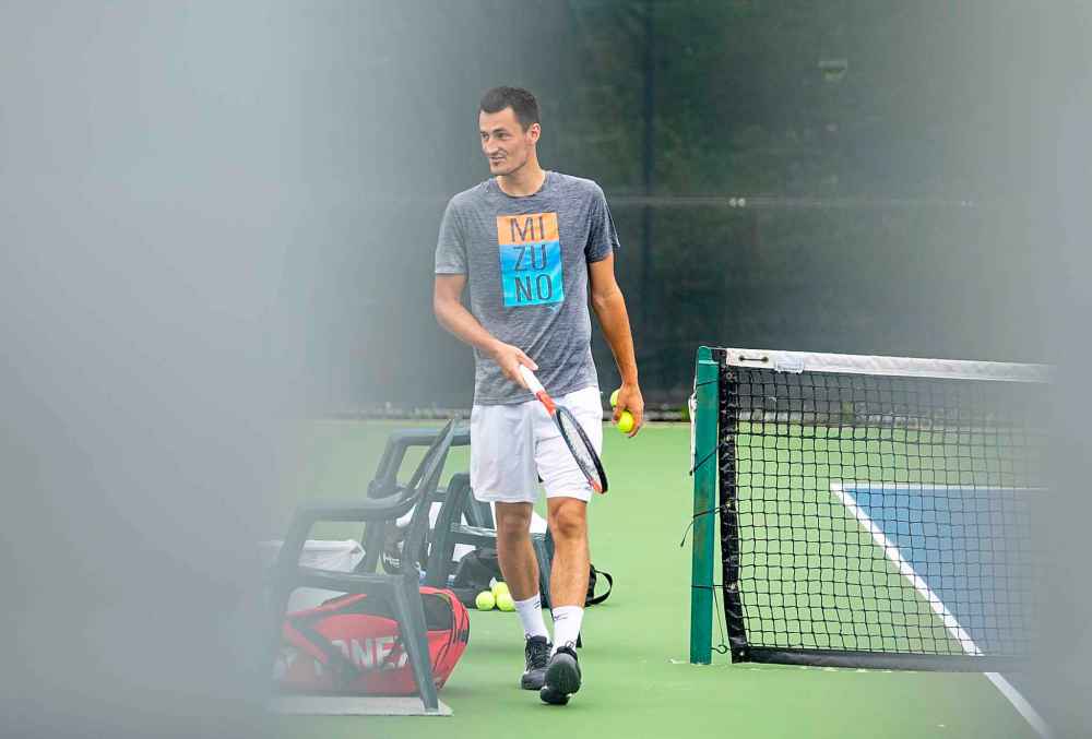 SASHA SEFTER / WINNIPEG FREE PRESS
Australian tennis pro Bernard Tomic gets in some practice Tuesday morning before competing in the National Bank Challenger at the Winnipeg lawn Tennis Club.
