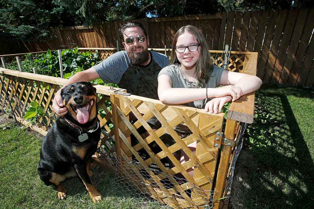 JOHN WOODS / WINNIPEG FREE PRESS
Tyler Frego and his daughter Jordan Wiebe, 13, hang out at his parents’ home in Winnipeg. Jordan will attend camp this summer through the support of the Sunshine Fund.