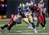 PHIL HOSSACK / WINNIPEG FREE PRESS FILES
Winnipeg Blue Bomber QB Chris Streveler runs through the Calgary line late in the game Thursday.