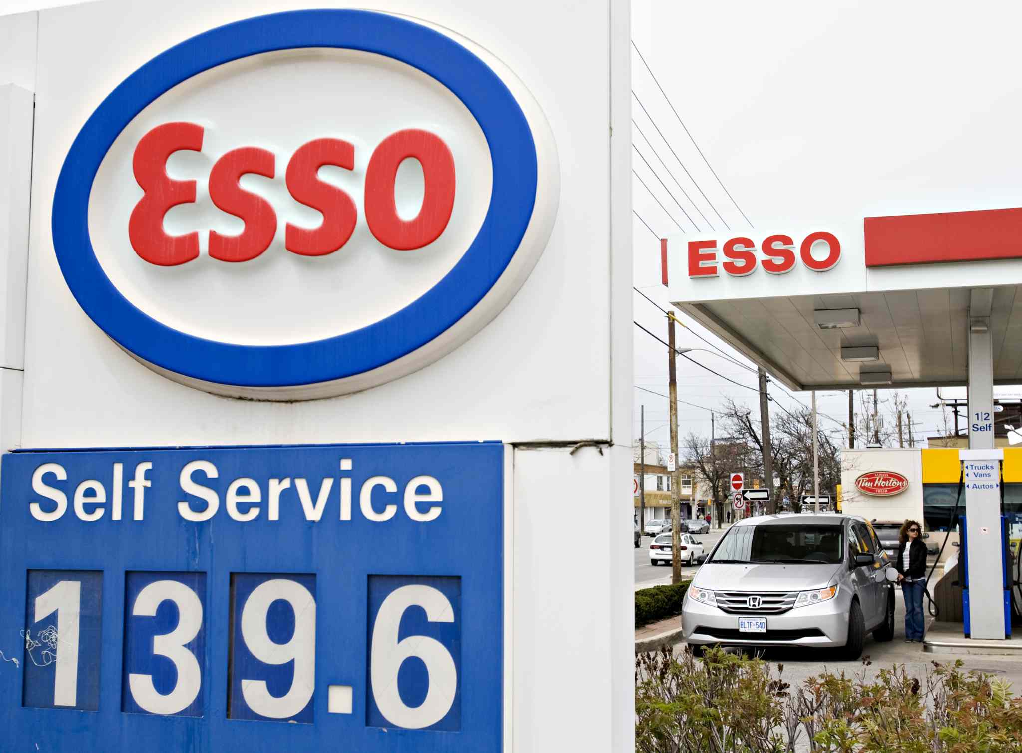 Imperial Oil to sell Esso stations to five fuel distributors for 2.8
