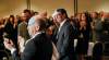 WAYNE.GLOWACKI@FREEPRESS.MB.CA 
Mark Chipman (centre) receives a standing ovation as he arrives at the Winnipeg Chamber of Commerce luncheon on Thursday.