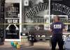 Wayne Glowacki/ Winnipeg Free Press
Fire investigator stands in front of tattoo shop this morning.