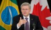 Prime Minister Stephen Harper speaks to members of the Canadian and Brazilian business community at the start of a meeting in Sao Paulo, Tuesday August 9, 2011. Harper commented on the present financial situation affecting the world economy. THE CANADIAN PRESS/Adrian Wyld