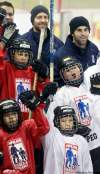 WAYNE GLOWACKI / WINNIPEG FREE PRESS
Winnipeg Jets players Andrew Ladd (top right) and Eric Fehr (top centre) gave the kids lots of pro tips and had fun doing it on Thursday at the MTS IcePlex.