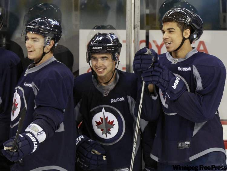 Wayne Glowacki / Winnipeg Free Press
Winnipeg Jets (from left) Alexander Burmistrov, Tim Stapleton and Evander Kane during practice in the MTS Centre Friday. The Winnipeg Jets play the Toronto Maple Leafs at 6 p.m. on Dec. 31 in the MTS Centre.
