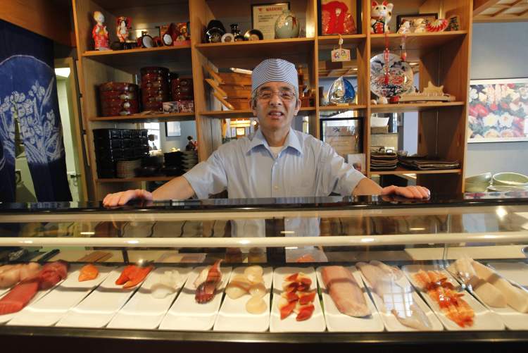 Wayne Glowacki / Winnipeg Free Press
Sadao Ohno, behind the sushi bar of his Edohei restaurant, will close the place Saturday.