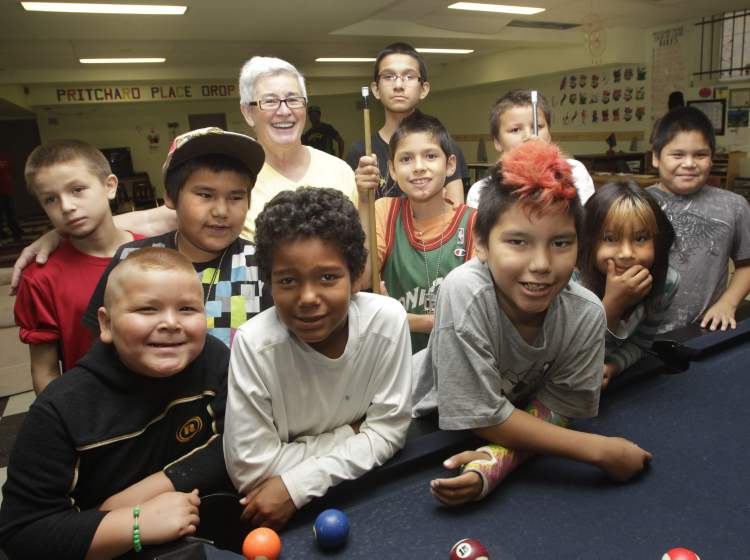 Dividing Lines. Dilly Knol, Executive Director with some inner city kids at the Andrews Street Family Centre. Lindor Reynolds story (WAYNE GLOWACKI/WINNIPEG FREE PRESS) Winnipeg Free Press Aug. 9 2012