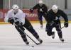 Wayne Glowacki / Winnipeg Free Press
At right, Winnipeg Jets centre Bryan Little and Dallas Stars centre Ryan Garbutt (a former Winnipegger) chase after puck during practice at the MTS Iceplex Friday as the NHL lockout continues.