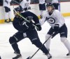 Wayne Glowacki / Winnipeg Free Press
Winnipeg Jets Dustin Byfuglien (left) and Bryan Little do some horsing around in an informal practice at the MTS Centre Friday.