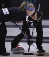 WAYNE GLOWACKI / WINNIPEG FREE PRESS Archives
At left, Ashley Howard and Jenna Loder on Team Overton-Clapham sweep a rock in a game against Team Kilgallen at the Scotties Tournament of Hearts in Stonewall, Man., Wednesday.