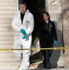 Wayne Glowacki/ Winnipeg Free Press
Winnipeg police at the Balmoral Street rooming house Wednesday where man was found dead in a suite Tuesday afternoon.