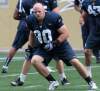 Defensive end Greg Peach, a recent addition to the Winnipeg Blue Bombers after being released by the Hamilton Tiger-Cats, practises with his new teammates at Investors Group Field Thursday.