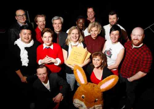 WAYNE GLOWACKI / WINNIPEG FREE PRESS
Theatre Projects Manitoba is staging White Rabbit, Red Rabbit.  Artistic director Ardith Boxall (centre) holding the scripts, while surrounded by some of the actors taking part in the production. From left to right in front are Tom Keenan and Janice Skene; second row: Loc Lu, Sarah Constible, Sharon Bajer, Shawna Dempsey and Carson Nattress; back row: Ian Ross, Arne McPherson, Gord Tanner,  Bathelemy Bolivar, Leith Clark and  Stephen Sim. Every night a lone actor will be given the script they have never seen before and then perform it on the spot.