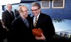 WAYNE.GLOWACKI@FREEPRESS.MB.CA
Inside Canad Inns Stadium Wednesday, Mayor Sam Katz congratulates David Asper after the announcement of a plan to accelerate the construction of the new stadium at the U of M.
