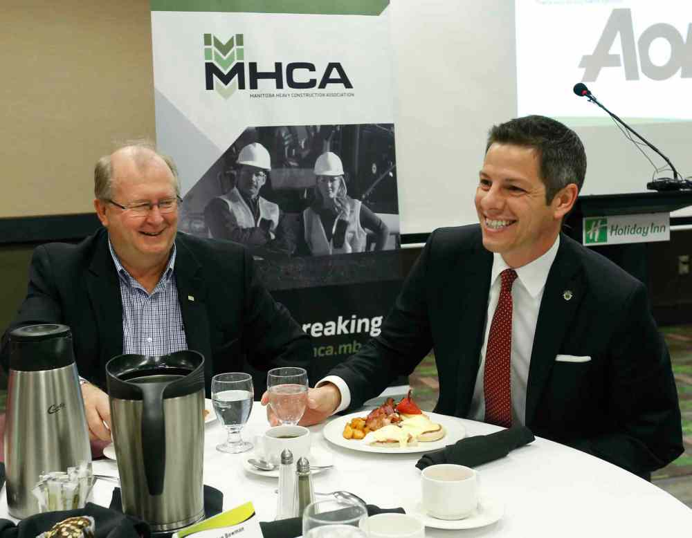 WAYNE GLOWACKI / WINNIPEG FREE PRESS
At right, Mayor Brian Bowman, with Chris Lorenc, president of the Manitoba Heavy Construction Association at the MHCA Breakfast Friday.