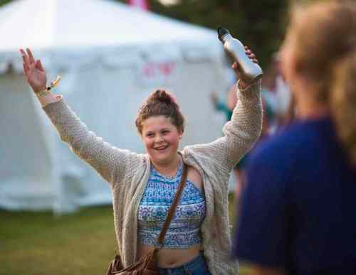 Winnipeg Free Press
Greta Lahm catches bubbles at the Winnipeg Folk Festival in Birds Hill Park on Friday, July 10, 2015.   Mikaela MacKenzie / Winnipeg Free Press