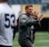 Wayne Glowacki / Winnipeg Free Press
Winnipeg Blue Bomber Head Coach Mike O'Shea jokes around with players at the practice at Investors Group Field Thursday.