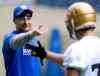 WAYNE GLOWACKI / WINNIPEG FREE PRESS    Head Coach Mike O'Shea exchanges information with wide receiver Alex Vitt at the Winnipeg Blue Bomber rookie camp at IGF Friday morning.