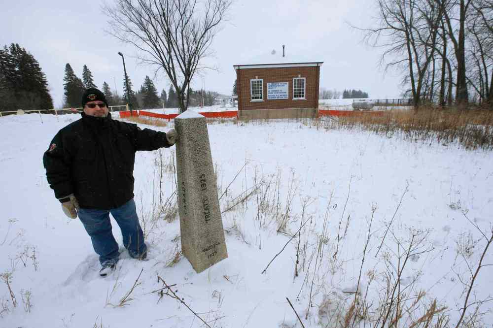 WAYNE GLOWACKI / WINNIPEG FREE PRESS
Doug Johnston, Councillor in the RM of Emerson-Franklin stands on the Canadian side of the international border marker near Emerson.