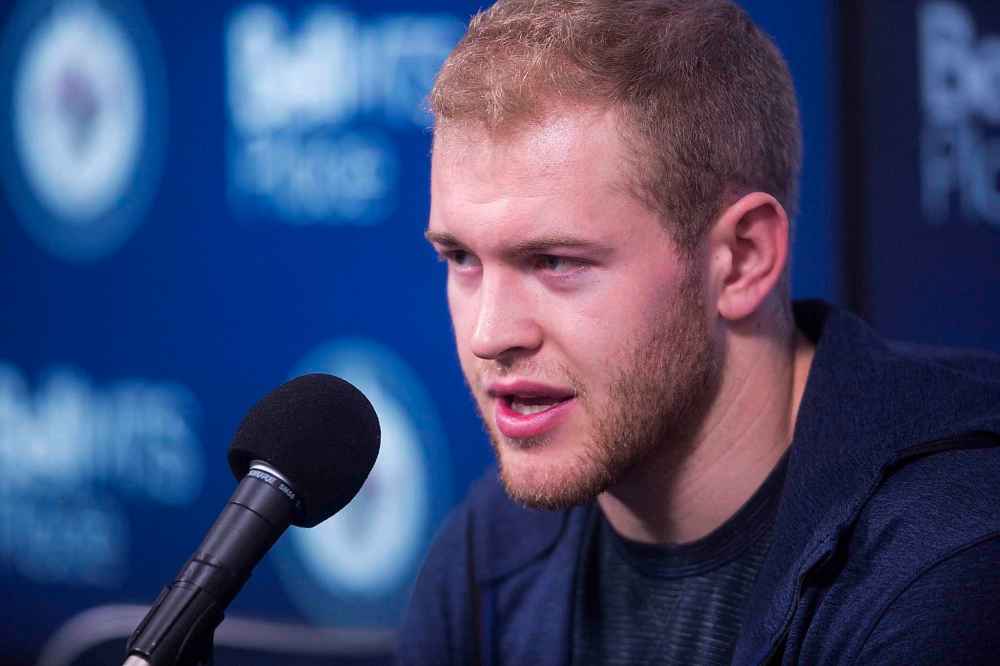 MIKAELA MACKENZIE/WINNIPEG FREE PRESS FILES
Andrew Copp speaks to the media at the end of the Jets' season in April 2019.