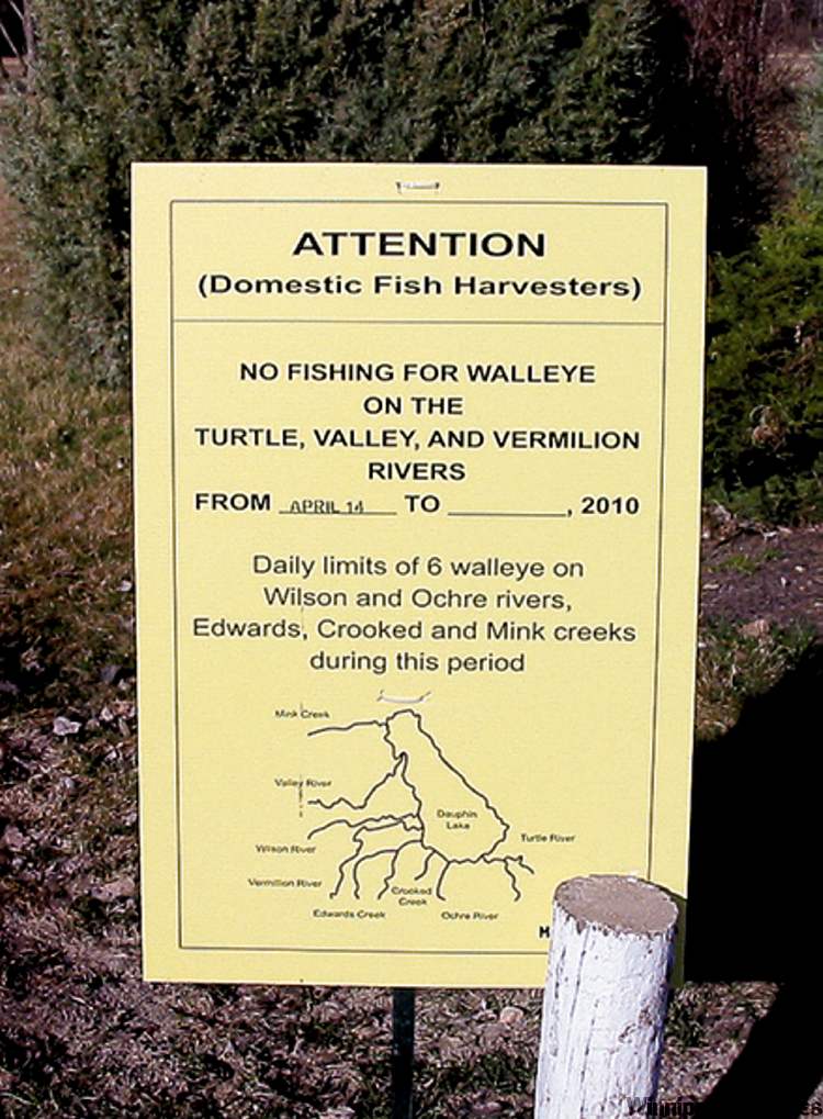 A sign warns of the ban on fishing for spawning pickerel.