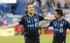Montreal Impact's Lassi Lappalainen, left, celebrates with teammate Bojan after scoring against FC Dallas during first half MLS soccer action in Montreal, Saturday, August 17, 2019. The Montreal Impact are heading into a pivotal Eastern-Conference match with one major factor on their side ? they won't have to face Wayne Rooney. Due to a suspension, the former England international will not be on the Saputo Stadium pitch when the Impact (11-14-4) host D.C. United (10-10-9) on Saturday night in a meeting with significant playoff implications for both teams. THE CANADIAN PRESS/Graham Hughes