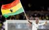 Luca Bruno / the associated press
John Pantsil waves a Ghanaian flag as he celebrates a 1-0 win over Serbia on Sunday in Pretoria.
