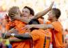 FRANK AUGSTEIN / THE ASSOCIATED PRESS
Dutch teammates mob Dirk Kuyt (left) after his second-half goal put the Netherlands ahead 2-0 in their World Cup match versus Denmark Monday in Johannesburg.