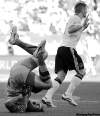 The Associated Press
Matt Dunham / the associated pressSerbian goalkeeper Vladimir Stojkovic falls to the ground after colliding with Germany�s Bastian Schweinsteiger.
