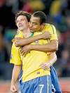 FRANK AUGSTEIN / THE ASSOCIATED PRESS
Brazil’s Gilberto Silva (right) hugs team­mate Elano after Elano’s goal Sunday.