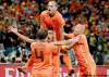 Eugene Hoshiko / the associated press
Netherlands' Giovanni van Bronckhorst, centre, celebrates after scoring a goal with teammates Joris Mathijsen, Wesley Sneijder (10) and Demy de Zeeuw (14).