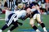 JOHN WOODS / THE CANADIAN PRESS
Blue Bombers quarterback Buck Pierce (right) is crunched by Toronto’s Lin-J Shell during first-half action Friday night at Canad Inns Stadium.