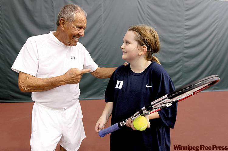 JOE.BRYKSA@FREEPRESS.MB.CA
Nick Bollettieri coaches 10-year-old Greer Glodjo at the Winnipeg Winter Club.