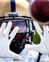 MIKE DEAL / WINNIPEG FREE PRESS archives
Wide receiver Chris Davis eyes a throw at practice earlier this season. He's preparing for what's expected to be his first start.