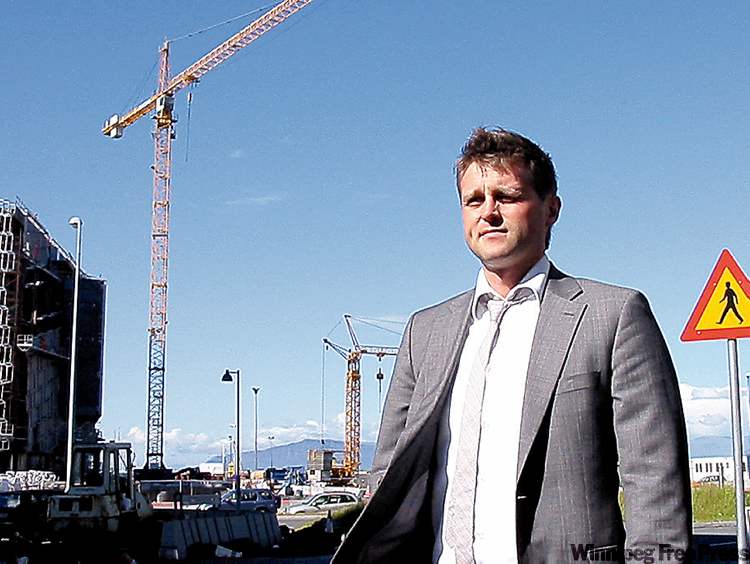 Tomas Brynjolfsson worked at Landsbanki, one of Iceland’s three banks that collapsed. Now he’s an economist with the country’s finance department. The cranes on Reykjavik streets work at government-financed projects only. All other construction projects halted when the nation went bankrupt.