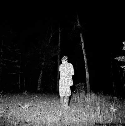 SUPPLIED PHOTO
In Untitled (Midnight Pee at the Cottage), 1993, artist Larry Glawson gives the familiar chore of taking the dog out an eerie undertone.
