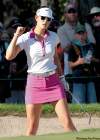 JOE.BRYKSA@FREEPRESS.MB.CA
Michelle Wie pumps her fist after holing a bunker shot for birdie on the 17th hole during Thursday's opening round of the CN Canadian Women's Open at St. Charles Country Club. Wie shot a seven-under-par 65 to take the 18-hole lead.