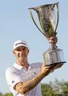 Nam Y. Huh / the associated press
Dustin Johnson came through on Sunday and got to hoist the hardware.