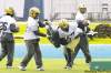 MIKE.DEAL@FREEPRESS.MB.CA
Winnipeg Blue Bombers' Jon Oosterhuis (77) executes a running drill during practice at Canad Inns Stadium Tuesday.