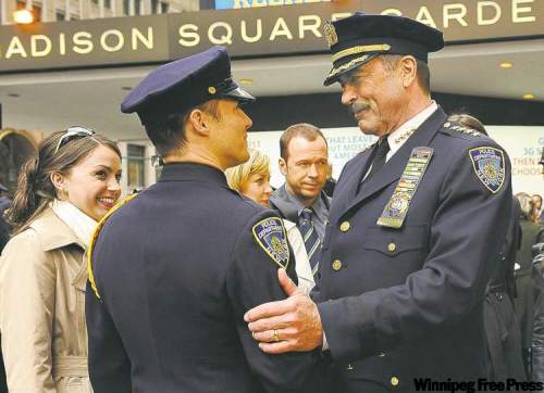 CBS
Moore, (left)  Estes, Wahlberg and Selleck in Blue Bloods.