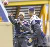 KEN GIGLIOTTI / WINNIPEG FREE PRESS
Wideout Adarius Bowman (right) works on his much-maligned catching skills with QB Steven Jyles on Thursday.