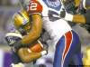 TREVOR HAGAN / WINNIPEG FREE PRESS
Winnipeg running back Fred Reid is brought down by Montreal's Ramon Guzman in the first half. The Blue fought hard all night but were eventually felled 44-40 by the Als.