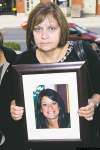 NATHAN DENETTE / THE CANADIAN PRESS
‘If I die, will you make sure my mom knows that I love her?’ Jessica Lloyd, in photo held by her mother Roxanne arriving at court Tuesday, pleaded with Williams on the day she was murdered.