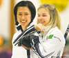 WAYNE.GLOWACKI@FREEPRESS.MB.CA
Jennifer Jones (right) and second Jill Officer look pleased with their play against the Shauna Streich rink Friday.