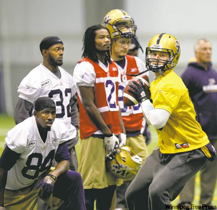 WAYNE.GLOWACKI@FREEPRESS.MB.CA
Winnipeg Blue Bombers fourth-string quarterback Joey Elliott works out Tuesday. Bomber coaches are impressed with his attitude.