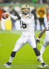 john ulan / the canadian press
Blue Bombers rookie quarterback Joey Elliott leans into a pass Saturday night in Edmonton. He was making his first CFL start.