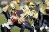 John Woods / the canadian press
Blue Bombers QB Joey Elliot is sacked by Calgary's Keon Raymond in the first half Friday night.