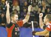 Dave Chidley / the canadian press
Skip Mike McEwen (left) celebrates with lead Denni Neufeld as Jeff Stoughton's final shot failed to score, handing McEwen's team its first Grand Slam win.