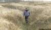 KEN GIGLIOTTI / WINNIPEG FREE PRESS  / Oct  20 2019 - 101020 - Kevin Rollason  Remembrance Day features  story -  in pic  military historian Bruce Tascona  walks through   trench system  at  former WW1 trench warfare training area at Camp Hughes  ( formerly Camp Sewell ) , near Carberry . Camp Sewell  was opened  in 1909 and the name was changed to Camp Hughes in 1915 -  Camp Hughes was named after Major-General Sir Sam Hughes , 38,000 troops of the Canadian Expeditionary Force  trained in trench warfare , many fought Vimy Ridge